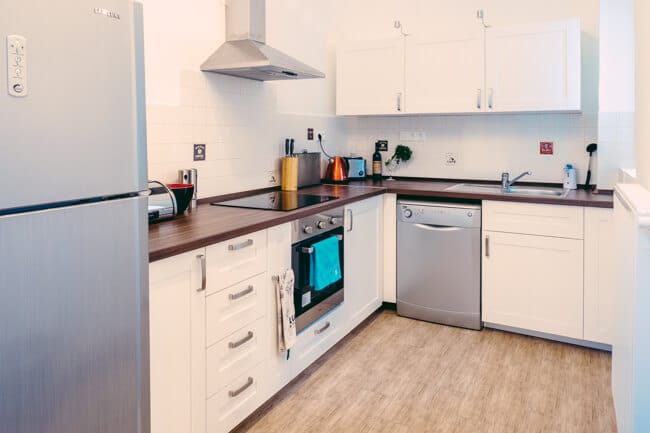 Kitchen as you walk in the apartment Kitchen as you walk in the apartment